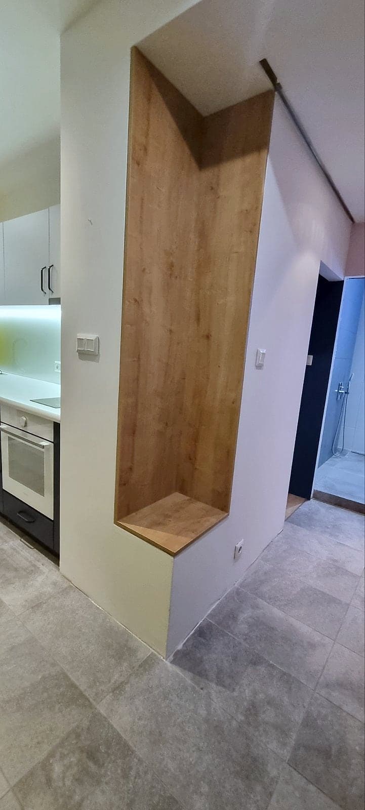 Apartment in Buxton: feature walls and laminate — Niche with a wood décor next to the kitchen