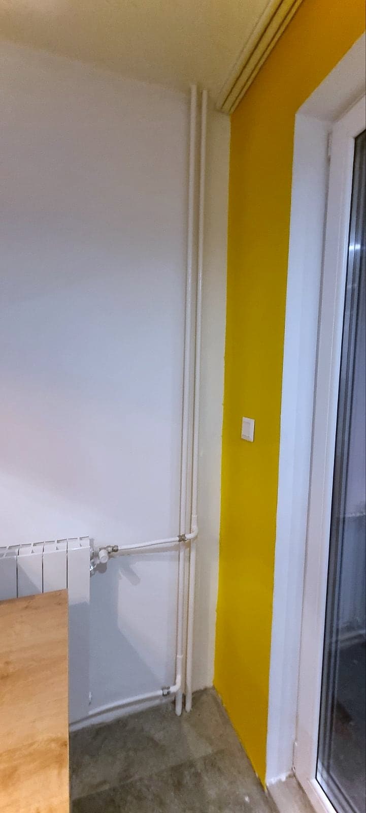Apartment in Buxton: feature walls and laminate — Yellow feature wall